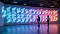 A dazzling showroom wall of Pixel devices glows with chrome and optimism.