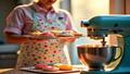 A baker in a pastel apron lifts a rainbow cookie tray outside a chapel; sprinkles cascade like confetti as sunlight hits a chrome mixer.