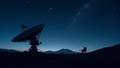 A lonely Deep Space Network dish under night sky, staring into stars like a dog that lost the ball.