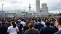 A tense crowd outside a nuclear plant gate as officials weigh reopening decisions under a ticking clock.