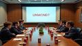 Boardroom table with coffee cups and soda cans arranged like a failed Venn diagram, executives staring at a PowerPoint slide that just says “UNWIND?” in jittery fonts.