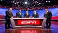 Ernie, Charles, Kenny, and Shaq on a gleaming ESPN desk as confetti falls, graphs orbit like satellites, and a producer silently prays to the ratings gods.