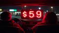 A neon price tag glows as customers cheer at the drive-thru window.