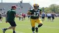 Micah Parsons jogs carefully at practice while Packers coaches watch with binoculars like anxious birders spotting the rare Lesser-Agitated Edge Rusher.