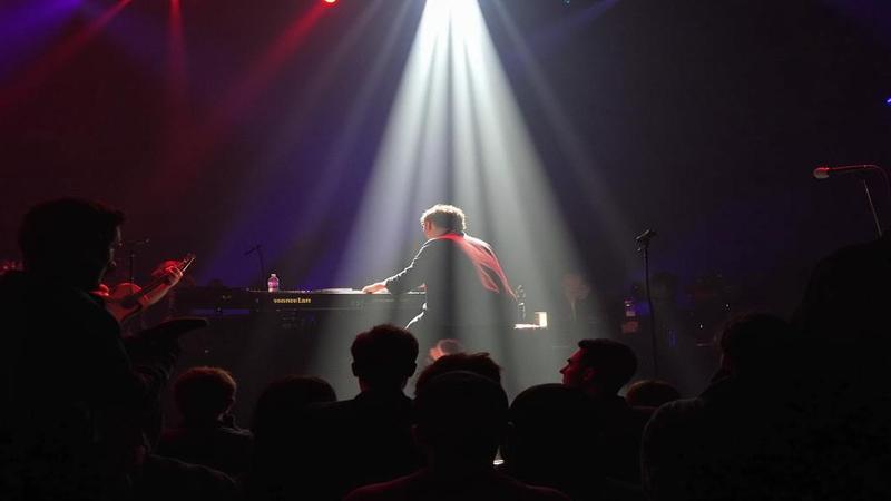Yunchan Lim on stage, sunlight illuminating the keyboard as the Seasons bow.