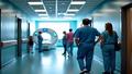 A hospital corridor hums beside a gleaming CT scanner as anxious family members wait in the glow of fluorescent lighting.
