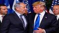 Netanyahu nods as Trump praises him on stage, cameras flashing and microphones everywhere.