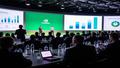 A conference room buzzes with charts and water bottles as Nvidia announces its pivot.