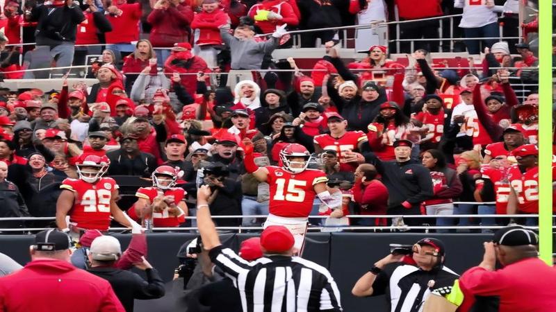 Freeze-frame of Mahomes’s post-TD moment from sideline, refs nearby, fans mid-cheer, arrows circling the ambiguous gesture.
