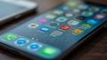A smartphone screen drenched in frosted-glass blur, while a user squints at icons that refuse to come into focus.