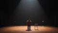 Kenan Thompson stands on a nearly empty stage, a single chair looming as the rest of the cast exits.