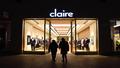 Flashbulbs explode on Claire's storefront as investors whisper about a buyout treating clearance as optional.